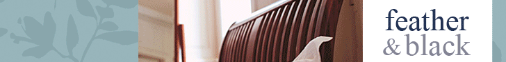 Feather and black bedroom furniture